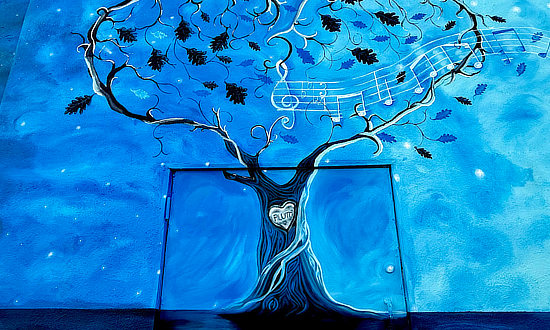 Mural at Arizona Music Pro, at 122 East Route 66 in Flagstaff ... Painted by local artist Jo Rohrbacker
