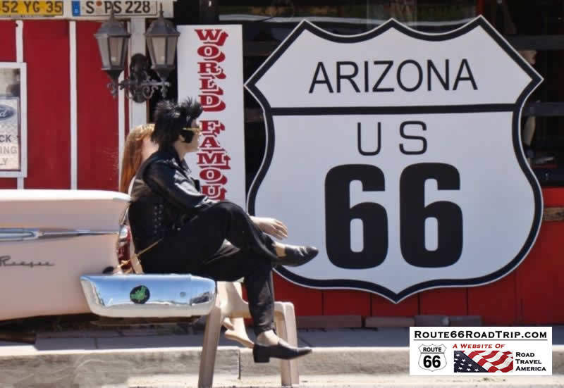 Elvis and friend on a break on Historic Route 66 in Seligman, Arizona Elvis and friend on a break on Historic Route 66 in Seligman, Arizona
