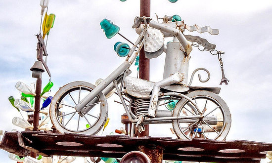 Motorcycle at Elmer Long's Bottle Tree Ranch in Oro Grande, California on Historic Route 66