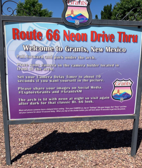 Instructions on how to take photos in the Route 66 neon arch in Grants, New Mexico