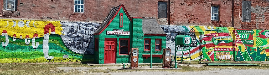 Allen's Conoco Fillin' Station in Commerce, Oklahoma, with new mural in 2025